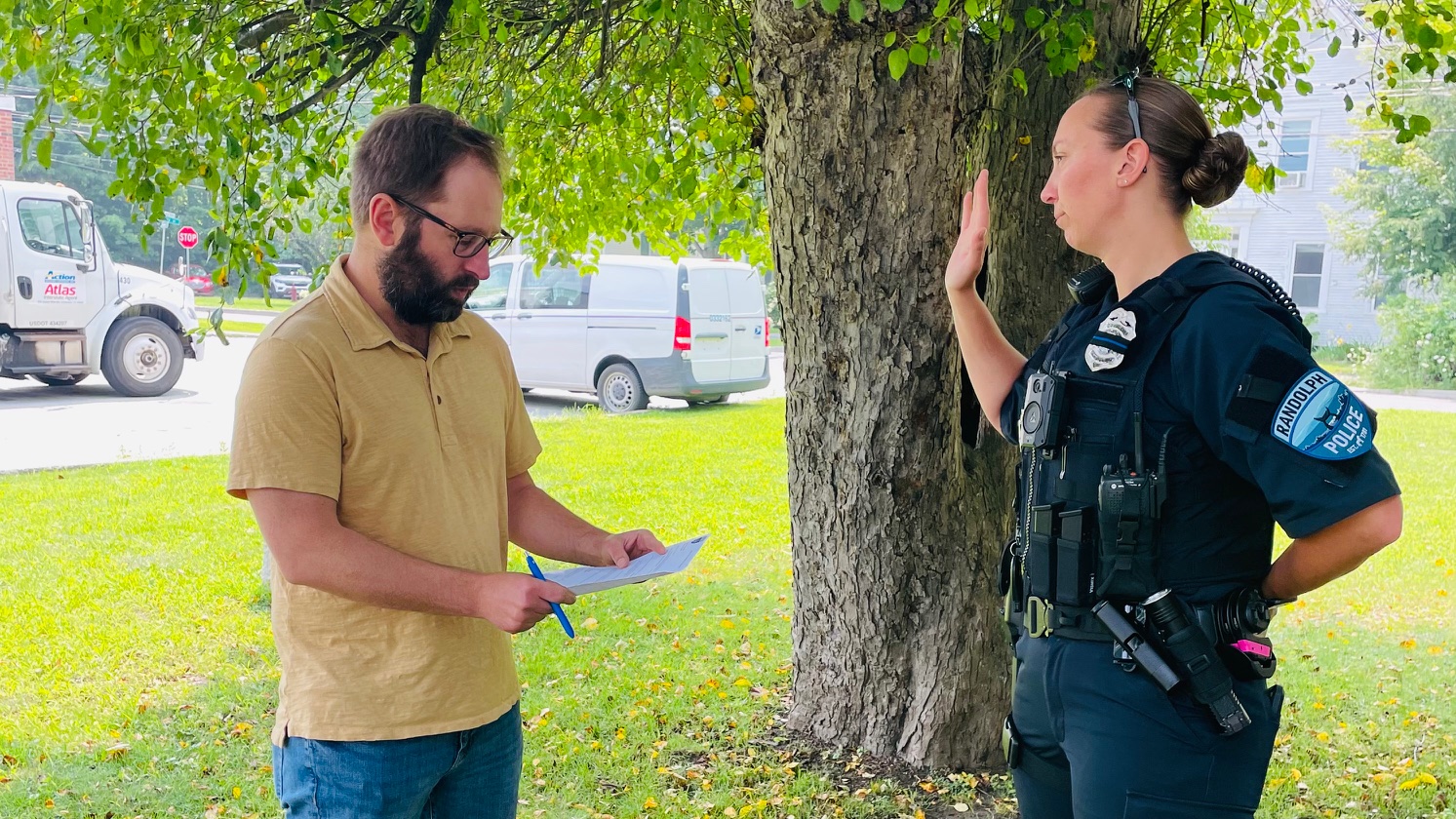 cop taking the oath to serve