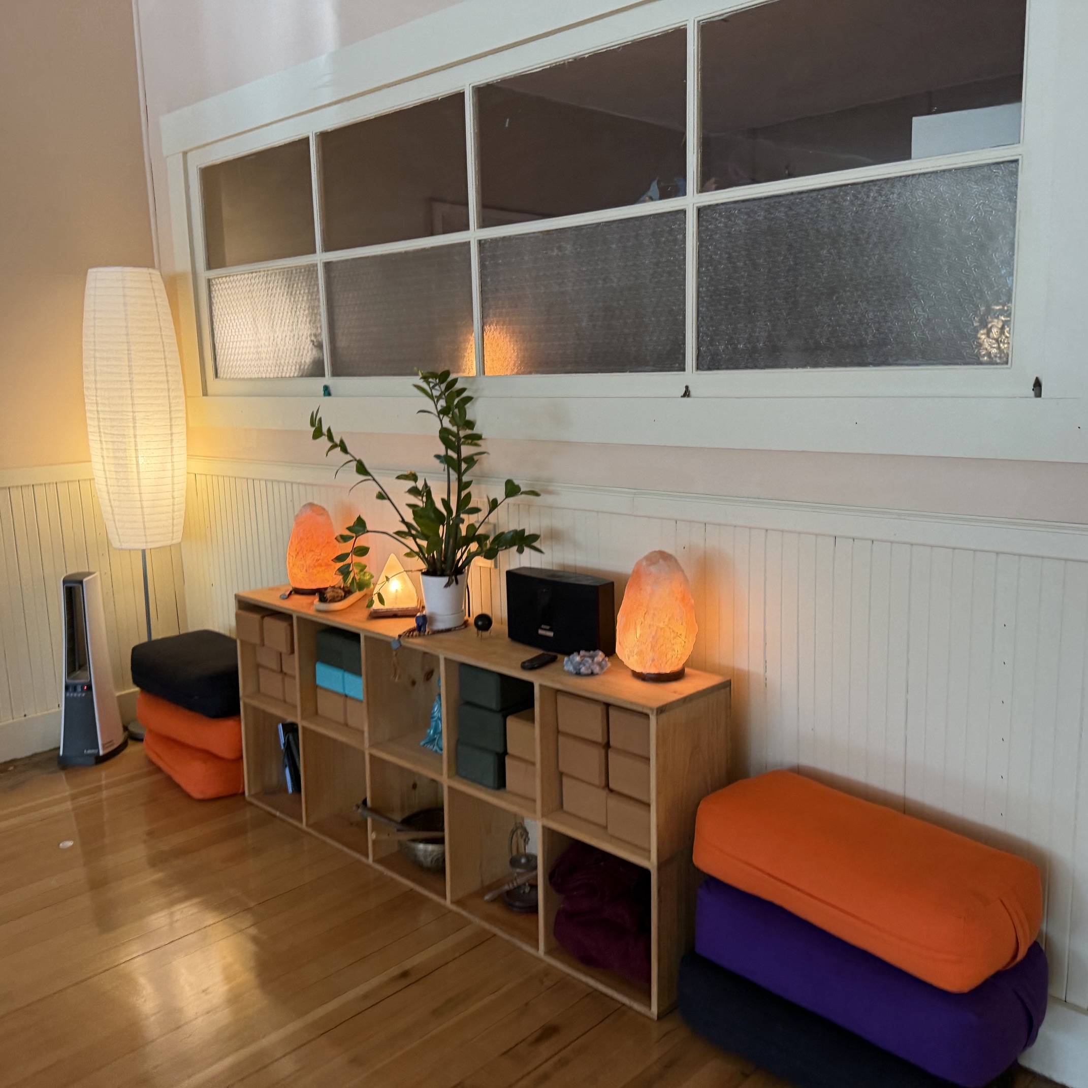 yoga studio w soft light and a calm seat