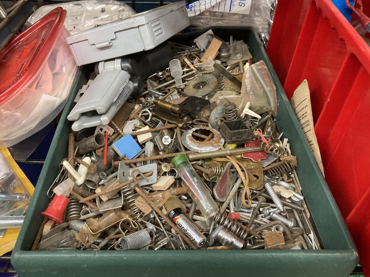 close up of a bin of various hardware things