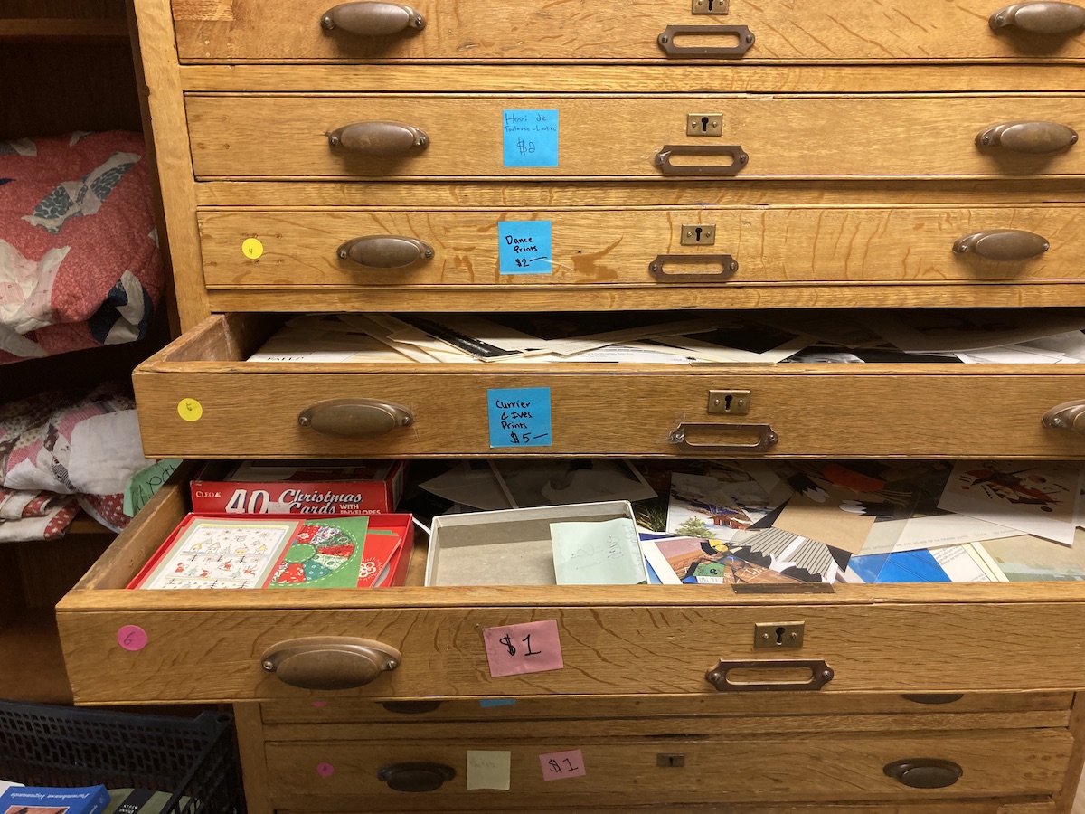 flat file drawers in a wooden cabinet