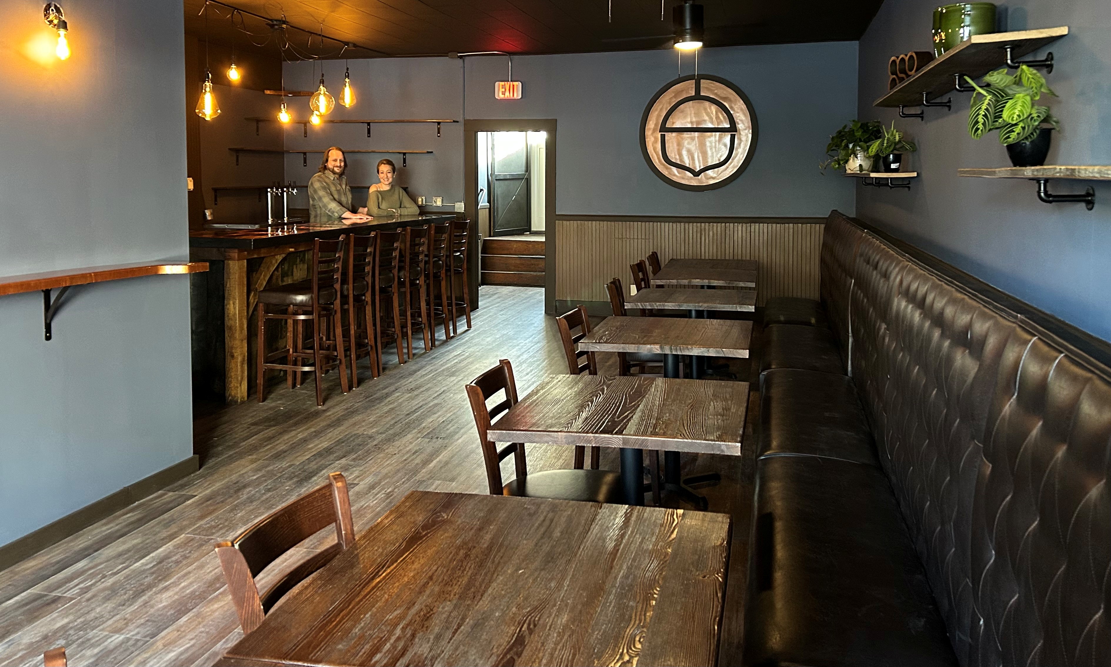 restaurant with wooden tables and floor