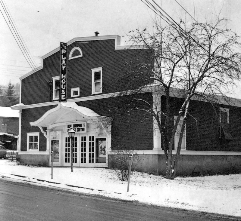 outdoor photograph of the Play House movie theater when it had the old sign hanging up.