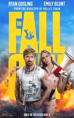 Movie poster with bright colors with two actors in front of a large fire