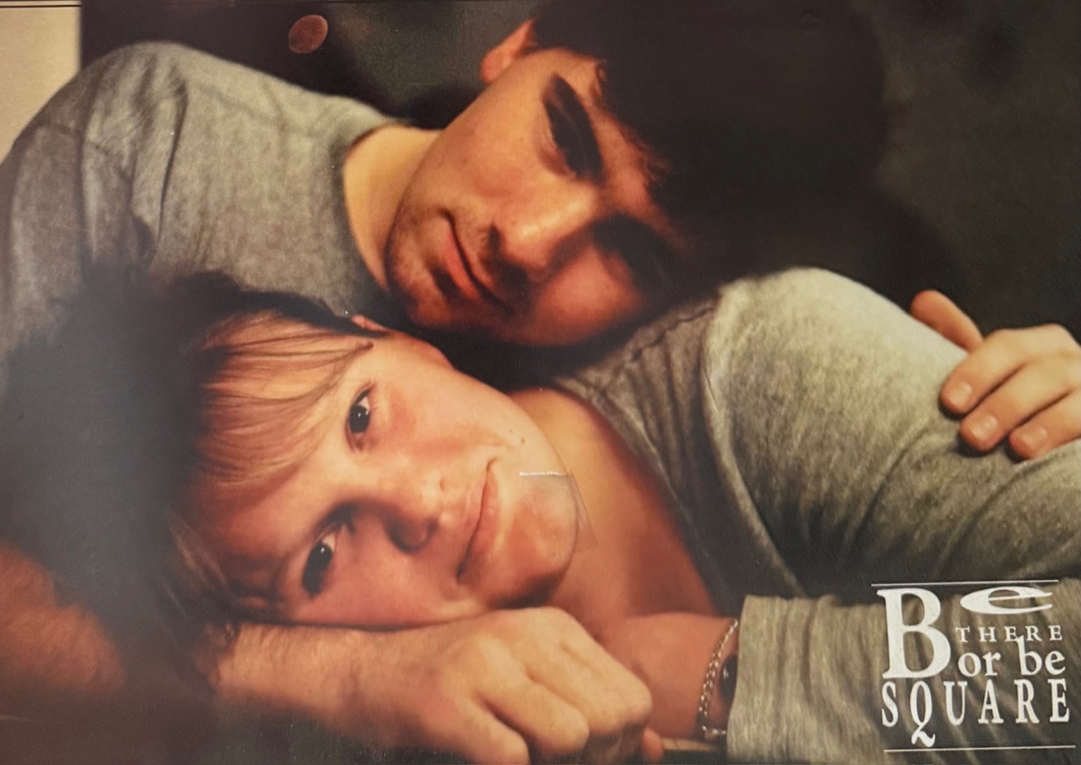 two lovers embracing w smiles