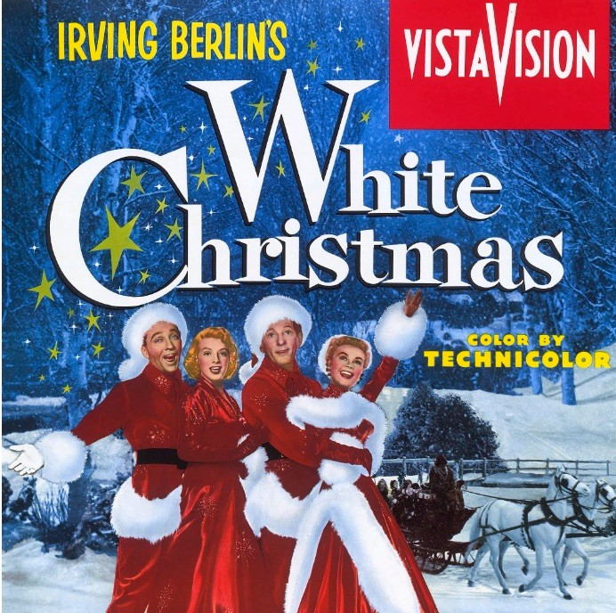 two couples w christmas (santa type) costumes in the snow