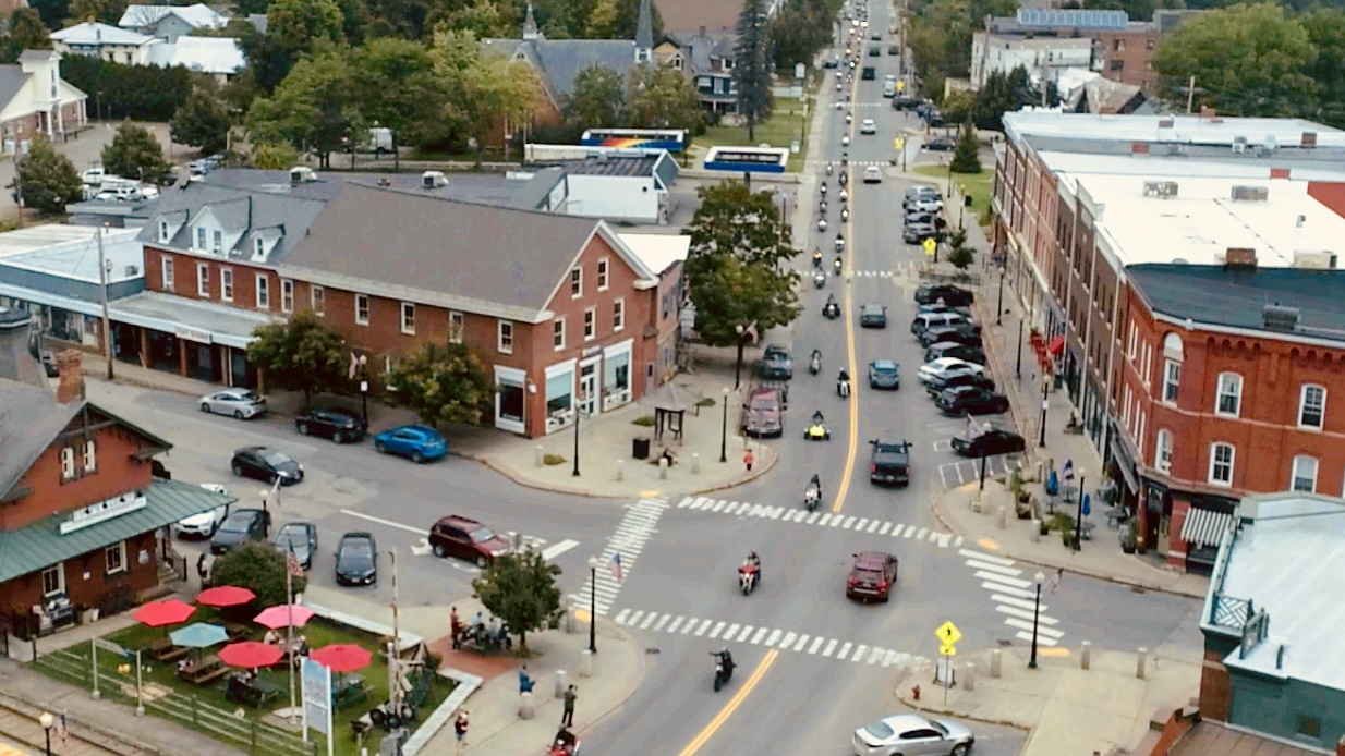 drone shot of downtown randolph including the outside dining area of the depot