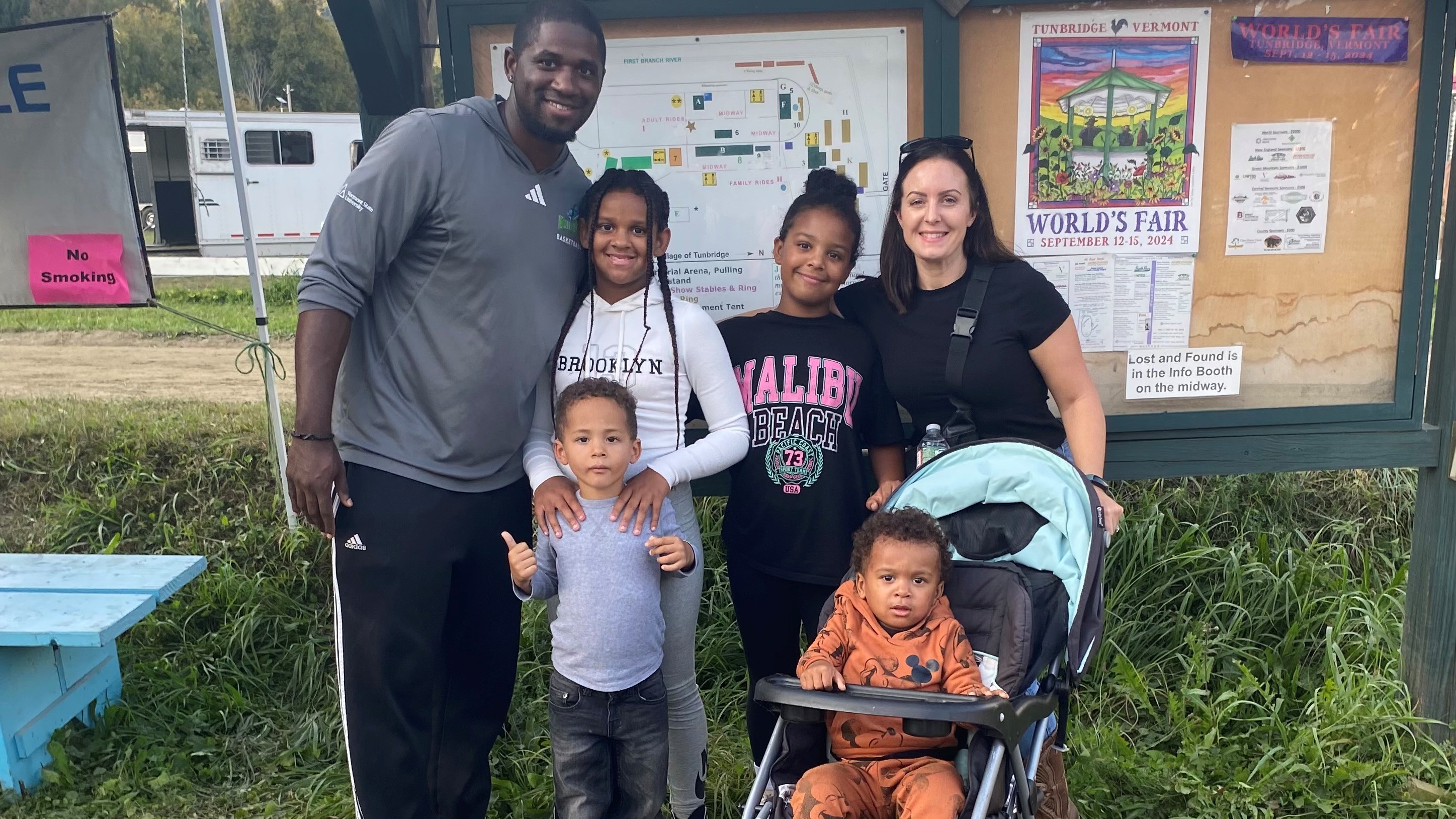 husband and wife with four children