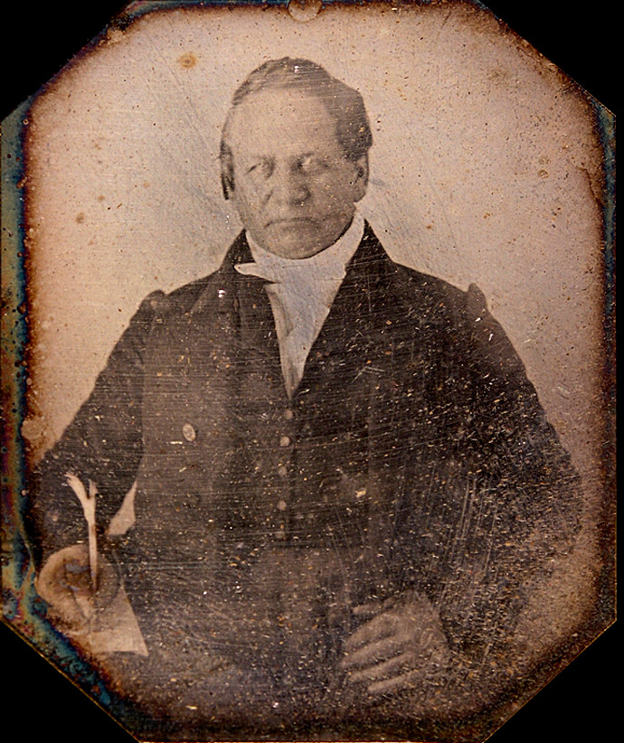 old pic on metal of business man